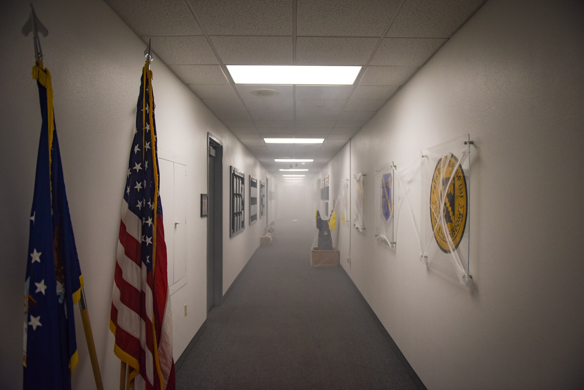 Smoke fills the hallways of the Nevada Test and Training Range headquarters during a fire drill at Nellis Air Force Base, Nevada, Oct. 4, 2018. The emergency evacuation exercise was part of the NTTR’s annual training requirement. (U.S. Air Force photo by Airman 1st Class Andrew D. Sarver)