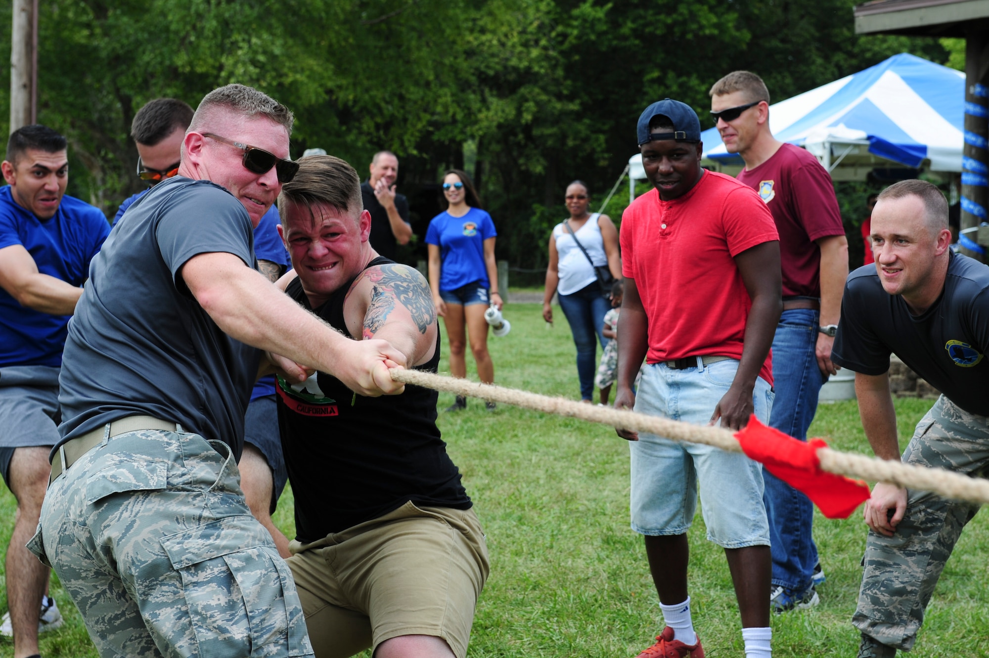 Team members from the Geospatial and Signatures Intelligence Group compete in a Tug-of-War competition during the National Air and Space Intelligence Center’s 50th Oktoberfest on Wright-Patterson Air Force Base, Ohio, Sept. 21, 2018. Members from the Space, Missiles and Forces Intelligence Group were declared the winners of the Oktoberfest Cup. (U.S. Air Force photo by Senior Airman Michael Hunsaker)