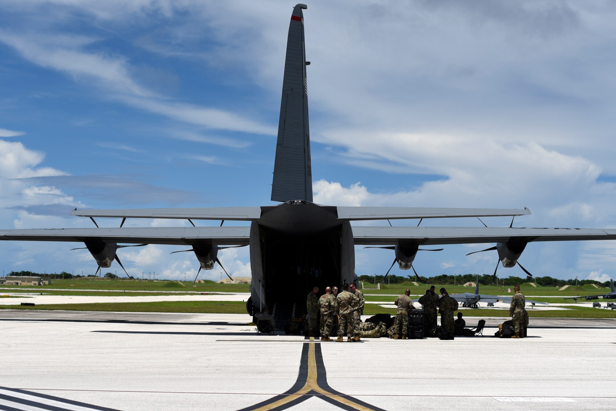 Airmen assigned to the 36th Contingency Response Group prepare to load a C-130J Super Hercules Oct. 05, 2018, at Andersen Air Force Base, Guam. United States Indo-Pacific Command is deploying as part of the broader U.S. Government effort to support Indonesia's request for humanitarian assistance.  This effort includes coordination with the U.S. Department of State and U.S. Agency for International Development, in constant consultation with Indonesian authorities. (U.S. Air Force photo by Senior Airman Gerald R. Willis)