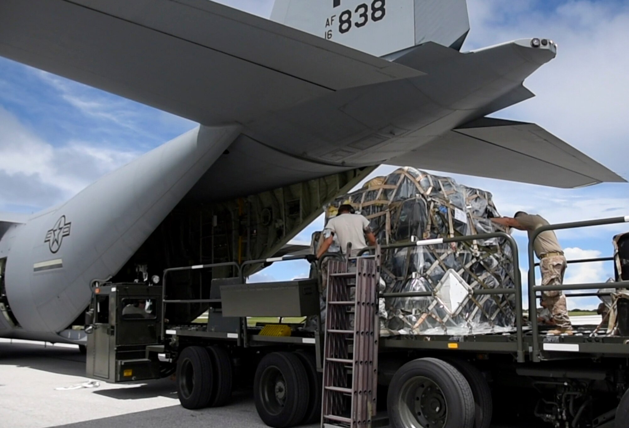 Airmen assigned to the 36th Contingency Response Group load a C-130J Super Hercules Oct. 05, 2018, at Andersen Air Force Base, Guam. United States Indo-Pacific Command is deploying as part of the broader U.S. Government effort to support Indonesia's request for humanitarian assistance.  This effort includes coordination with the U.S. Department of State and U.S. Agency for International Development, in constant consultation with Indonesian authorities. (U.S. Air Force photo by Senior Airman Gerald R. Willis)