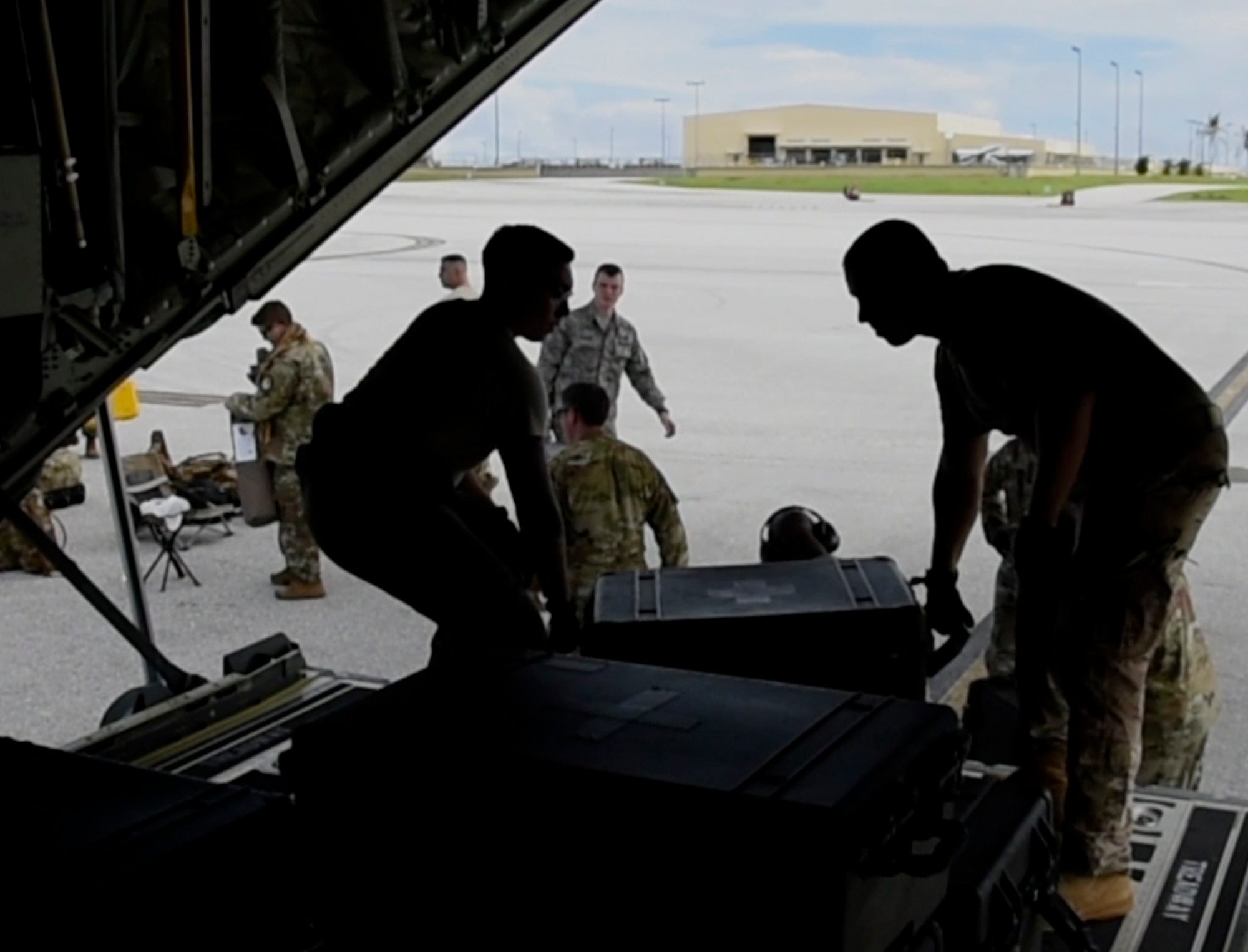 Airmen assigned to the 36th Contingency Response Group load a C-130J Super Hercules Oct. 05, 2018, at Andersen Air Force Base, Guam. United States Indo-Pacific Command is deploying as part of the broader U.S. Government effort to support Indonesia's request for humanitarian assistance.  This effort includes coordination with the U.S. Department of State and U.S. Agency for International Development, in constant consultation with Indonesian authorities. (U.S. Air Force photo by Senior Airman Gerald R. Willis)