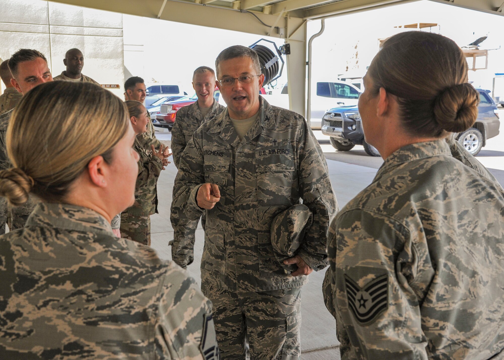Air Force Global Strike Command's Command Chaplain, Chap. (Col.) Randall Kitchens, greets the 377th Medical Group's Tech. Sgt. Margueriete Pinnix (left) and Master Sgt. Kate Grady (right) during a visit to Kirtland Air Force Base, N.M., Oct. 3, 2018. They visited Kirtland to gauge spiritual resiliency among Striker Airmen at the base. (U.S. Air Force photo by Jim Fisher)