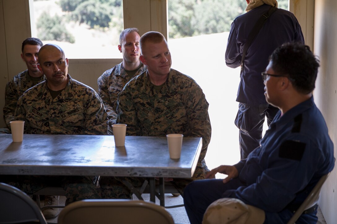 U.S. Marines with Task Force Koa Moana (TF KM) meet with a role player during a simutaled key leader engagement, part of Marine Corps Base Camp Pendleton, Calif., July 17, 2018. The exercise confirms TF KM is capable of cross cultural interaction, instruction, and relationship building while training alongside partner nations in order to meet Theater Security Cooperation engagement objectives. (U.S. Marine Corps photo by Staff Sgt. Gabriela Garcia)
