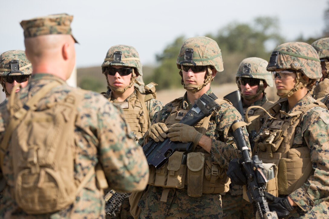U.S. Marine Corps Staff Sgt. Joshua G. Nickell, the platoon sergeant for Bravo Company, 7th Engineer Support Battalion (ESB), Task Force Koa Moana (TF KM), briefs 7th ESB Marines during the TF KM Mission Rehearsal Exercise at Marine Corps Base Camp Pendleton, Calif., July 18, 2018. The exercise confirmed TF KM is capable of cross cultural interaction, instruction, and relationship building while training alongside partner nations in order to meet Theater Security Cooperation engagement objectives. (U.S. Marine Corps photo by Staff Sgt. Gabriela Garcia)