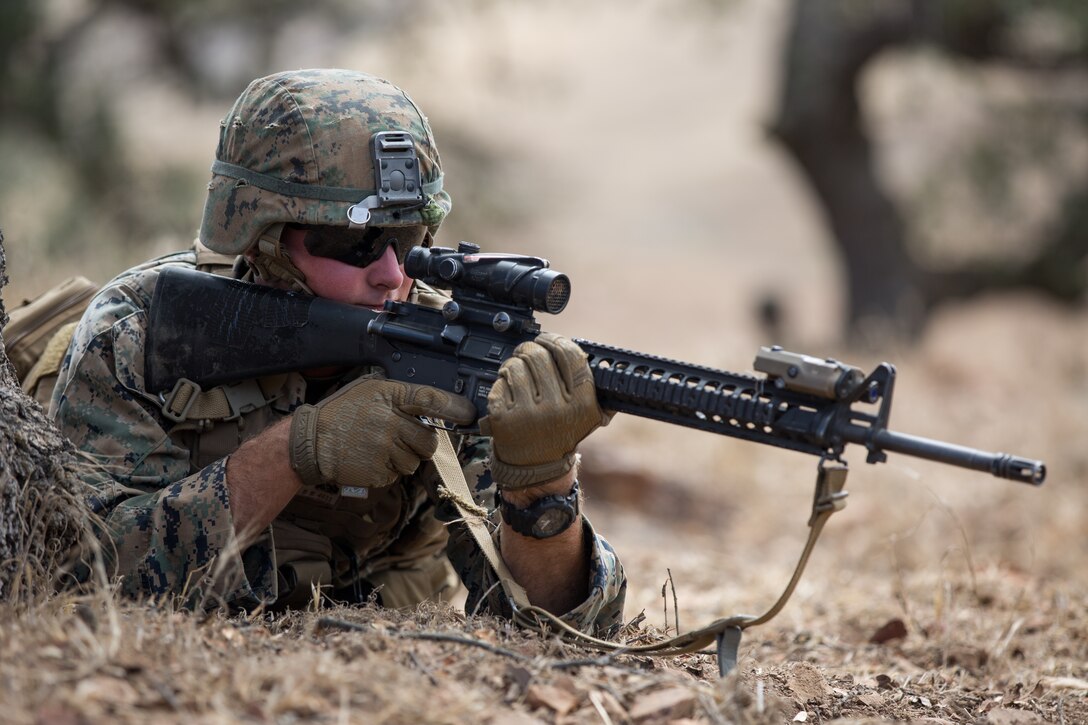 U.S. Marine Corps Cpl. Braiden M. Wadin, a combat engineer with Bravo Company, 7th Engineer Support Battalion, Task Force Koa Moana (TF KM), participates in a contact left attack during the TF KM Mission Rehearsal Exercise at Marine Corps Base Camp Pendleton, Calif., July 18, 2018. The exercise confirmed TF KM is capable of cross cultural interaction, instruction, and relationship building while training alongside partner nations in order to meet Theater Security Cooperation engagement objectives. (U.S. Marine Corps photo by Staff Sgt. Gabriela Garcia)