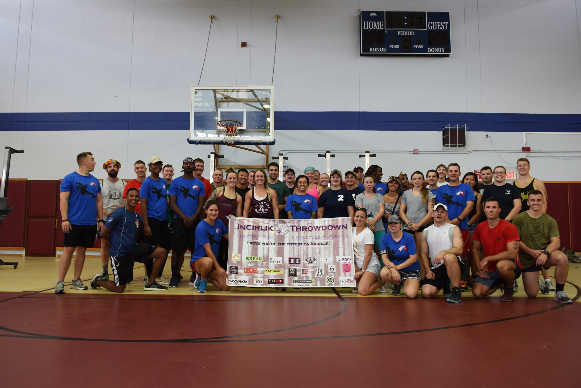 Competitors, spectators and volunteers pose for a photo after the Incirlik Throw Down CrossFit competition at Incirlik Air Base, Sept. 29, 2018.
