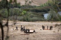 U.S. Marines with Bravo Company, 7th Engineer Support Battalion, Task Force Koa Moana (TF KM), build a South West Asia hut during the TF KM Mission Rehearsal Exercise at Marine Corps Base Camp Pendleton, Calif., July 18, 2018. The exercise confirms TF KM is capable of cross cultural interaction, instruction, and relationship building while training alongside partner nations in order to meet Theater Security Cooperation engagement objectives. (U.S. Marine Corps photo by Staff Sgt. Gabriela Garcia)