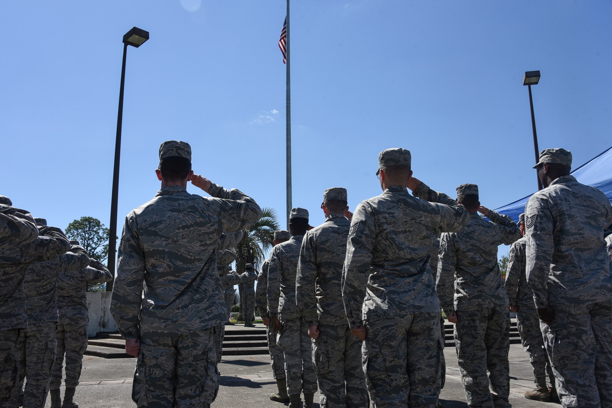 U.S. Air Force Airmen saluting