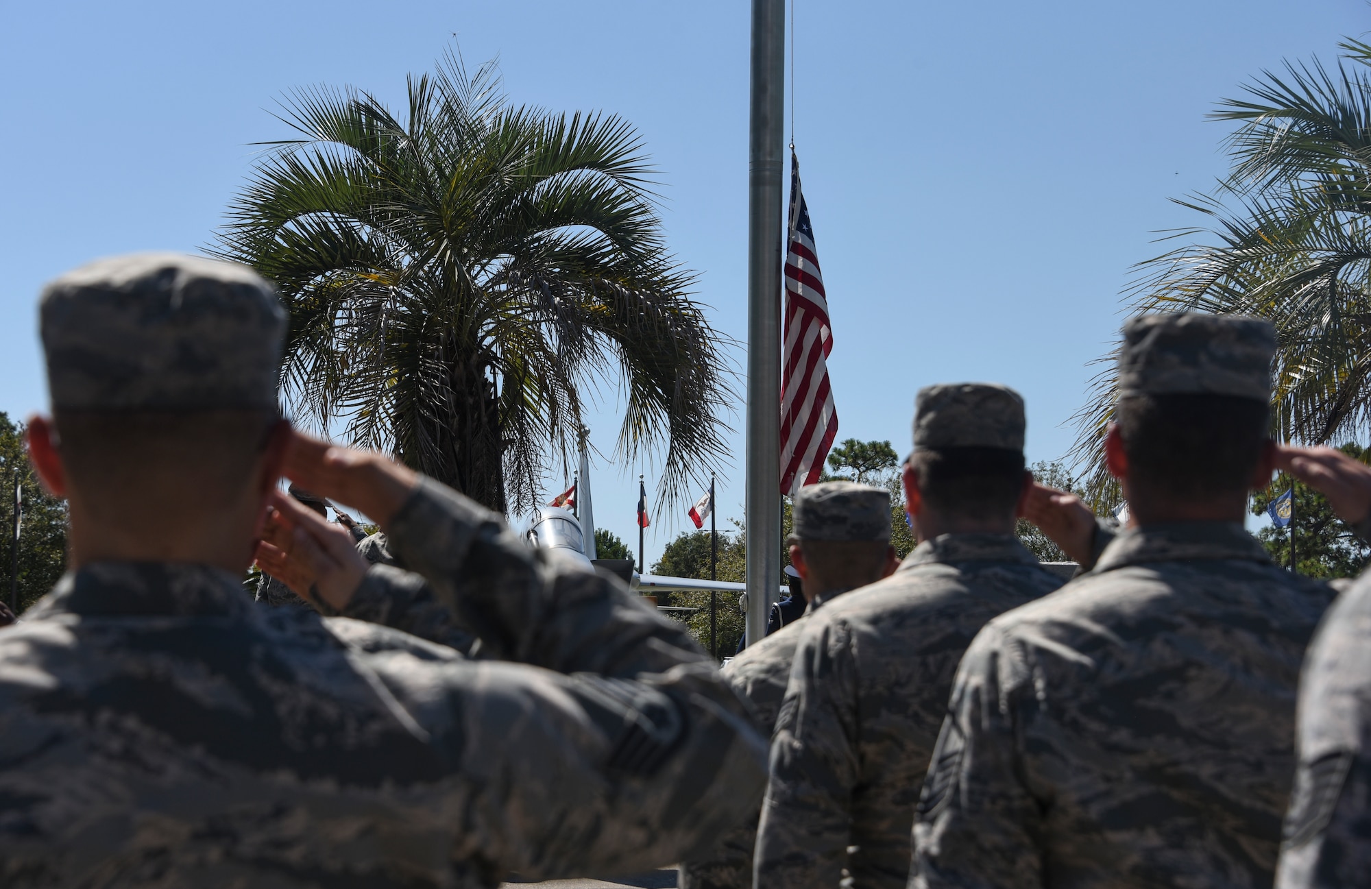 U.S. Air Force Airmen saluting