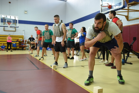 Contestants prepare to compete in the shuttle run during the Incirlik Throw Down CrossFit competition at Incirlik Air Base, Sept. 29, 2018.
