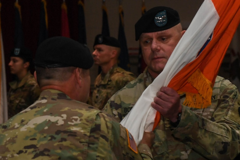 U.S. Army Col. Edward Boroweic, 93rd Signal Brigade incoming commander, assumes command of the 93rd Sig. Bde., during a change of command ceremony at Joint Base Langley-Eustis, Virginia, Oct. 4, 2018. U.S. Army Brig. Gen. Thomas Pugh, 7th Sig. Command (Theater) commanding general presided over the ceremony. (U.S. Air Force photo by Senior Airman Derek Seifert)