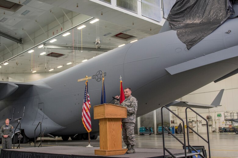 Brig. Gen. Darrin Slaten, commander of the 176th Wing, speaks of the new tail flash on the C-17 Globemaster IIIs assigned to the 176th Wing’s 144th Airlift Squadron on Joint Base Elmendorf-Richardson, Alaska, Oct. 1, 2018. Members of the Alaska Air National Guard’s 176th Wing and the Regular Air Force’s 3rd Wing witnessed the unveiling at a ceremony. (U.S. Air National Guard photo by Tech. Sgt. N. Alicia Halla)