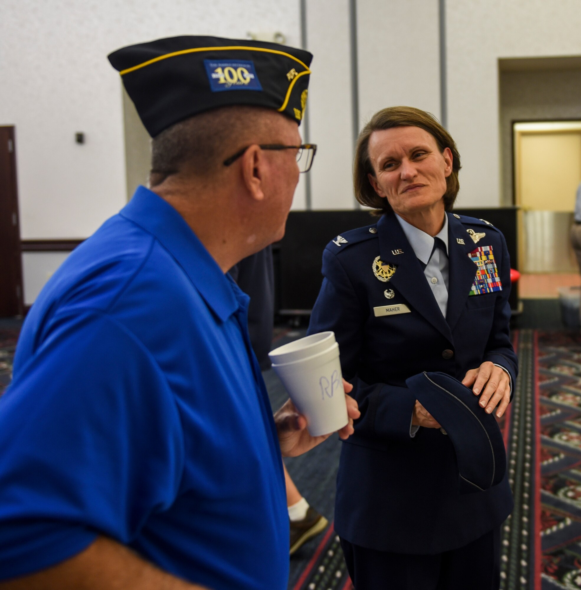 Col. Leslie Maher, 375th Air Mobility Wing commander, speaks with retired Air Force Capt. Ron Gilreath during Scott Air Force Base’s 33rd annual Retiree Appreciation Day, Oct. 6, 2018. Retirees were given the opportunity obtain information from several booths including the American legion, Red Cross, Veterans of Foreign Wars, and Airman and Family readiness center as well as have the ability to receive immunizations and update identification cards.(U.S. Air Force Photo by Airman 1st Class Chad Gorecki)