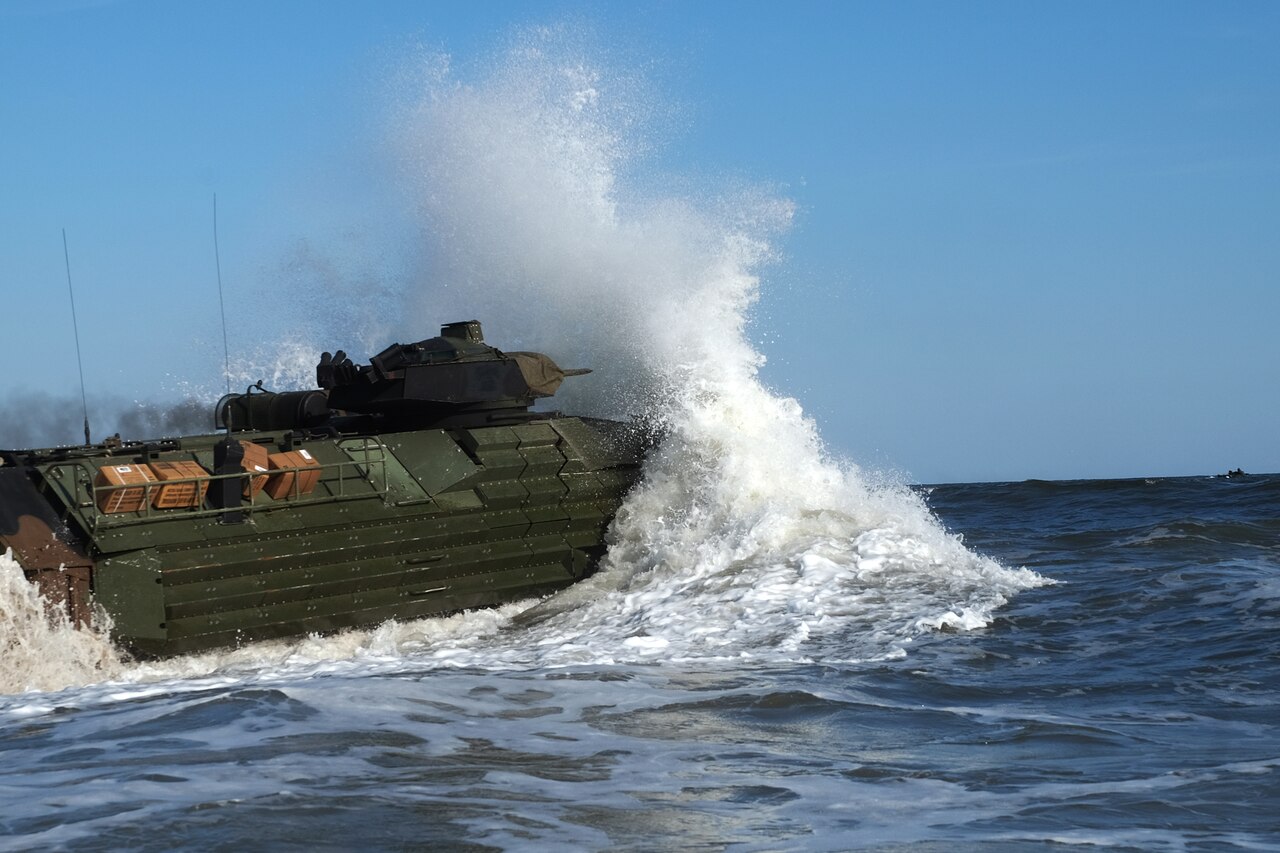 An amphibious assault vehicle with the 24th Marine Expeditionary Unit enters the water at Camp Lejeune, N.C.