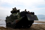 U.S. Marines with Assault Amphibious Vehicle Platoon, Echo Company, Battalion Landing Team, 2nd Battalion, 5th Marines, 31st Marine Expeditionary Unit and the Philippine Marine Corps land on the beach in assault amphibious vehicles during KAMANDAG 2 in Subic Bay, Philippines, Oct. 3, 2018. KAMANDAG helps maintain a high level of readiness and enhances bilateral military-to-military relations and capabilities.