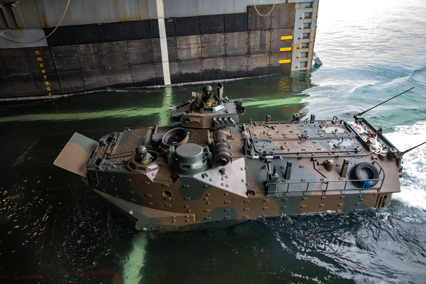The Japan Ground Self-Defense Force prepares to embark on the USS Ashland in assault amphibious vehicles during KAMANDAG 2 in Subic Bay, Philippines, Oct. 3, 2018. KAMANDAG helps maintain a high level of readiness and enhances bilateral military-to-military relations and capabilities.