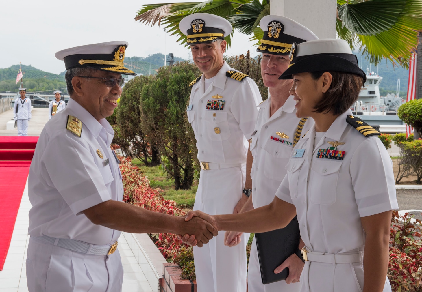 LUMUT, Malaysia (September 21, 2017) Royal Malaysian Navy Adm. Dato Seri Roslan, Commander, Western Fleet, greets U.S. Navy officers during an office call at Lumut Naval Base in Lumut, Malaysia as a part of Maritime Training Activity (MTA) Malaysia Sept. 21, 2017.  MTA Malaysia 2017 is a continuation of 23 years of maritime engagements between the U.S. Navy and Royal Malaysian Navy serving to enhance mutual capabilities in ensuring maritime security and stability.