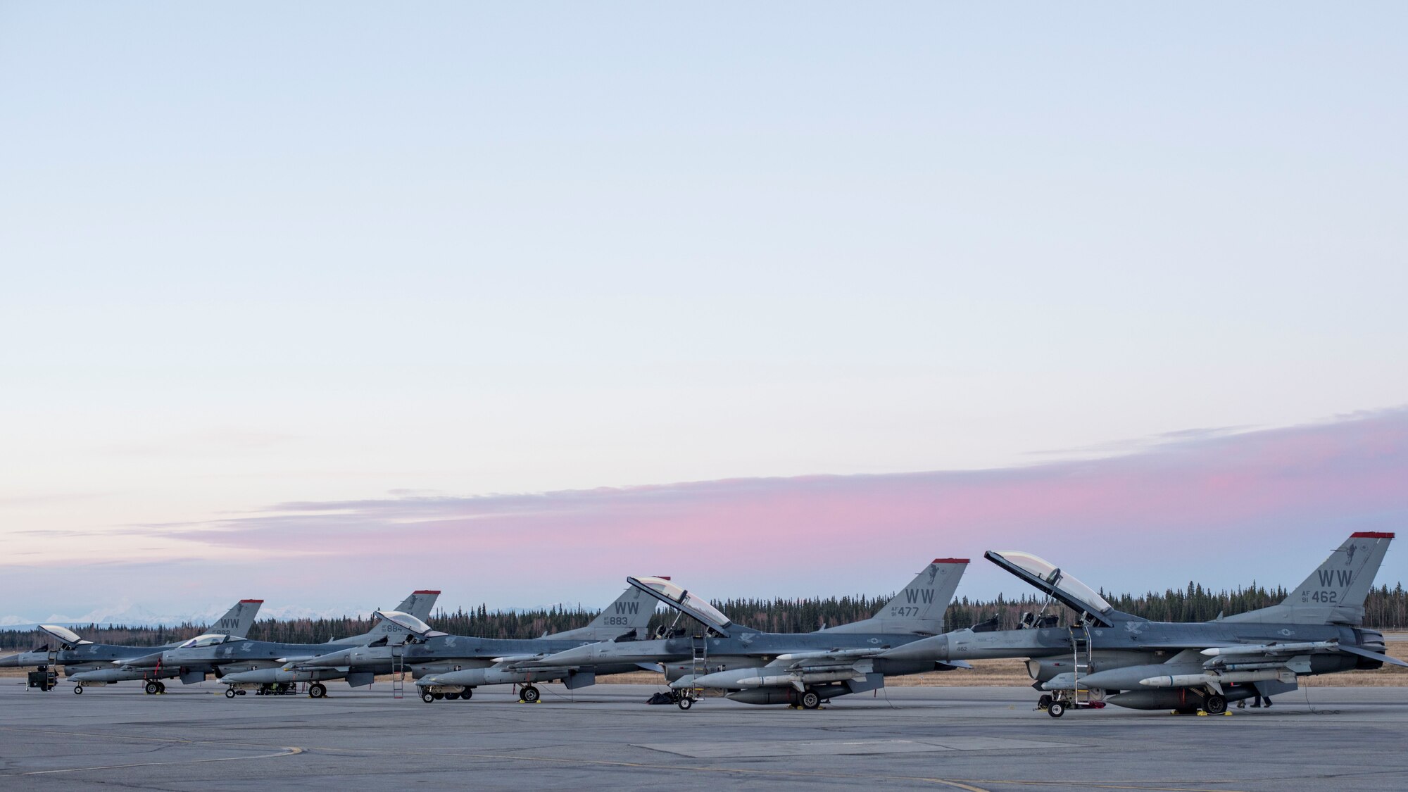 U.S. Air Force F-16 Fighting Falcons with the 13th Fighter Squadron sit on a runway during Exercise Red Flag-Alaska 19-1, at Eielson Air Force Base, Alaska, Oct. 6, 2018. RF-A 19-1, held Oct. 4 to 19, exposes all parties to combat-like scenarios to familiarize members with high-intensity, fast-paced operations to improve interoperability among allies. (U.S. Air Force photo by Airman 1st Class Collette Brooks)