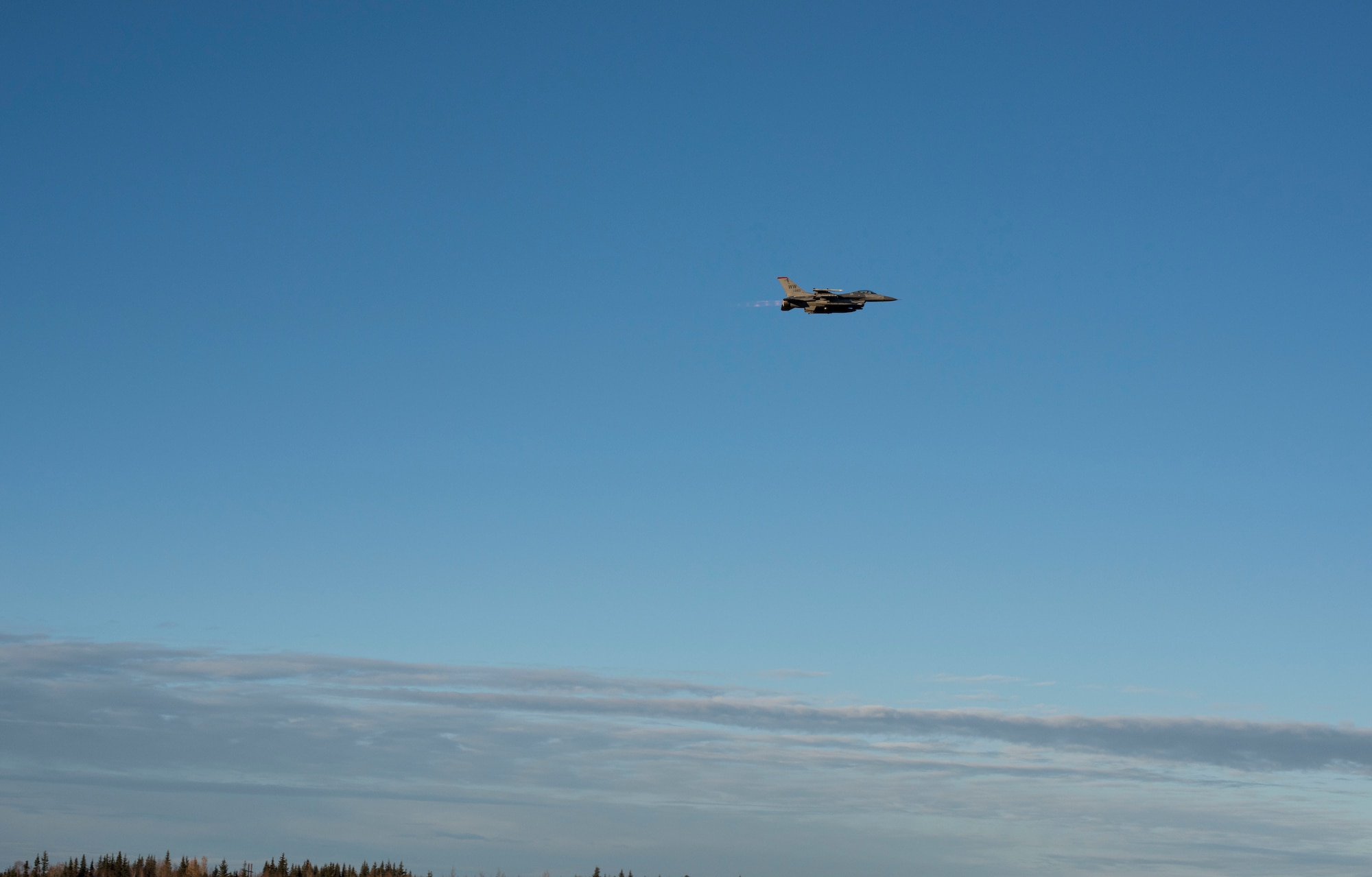 A 13th Fighter Squadron F-16 Fighting Falcon from Misawa Air Base, Japan, takes to the skies at Eielson Air Force Base, Alaska, Oct. 6, 2018. Exercise Red Flag-Alaska 19-1, held Oct. 4 to 19, centers around developing relationships with U.S. forces and their allies for a more comprehensive understanding of partner training and tactics. (U.S. Air Force photo by Airman 1st Class Collette Brooks)