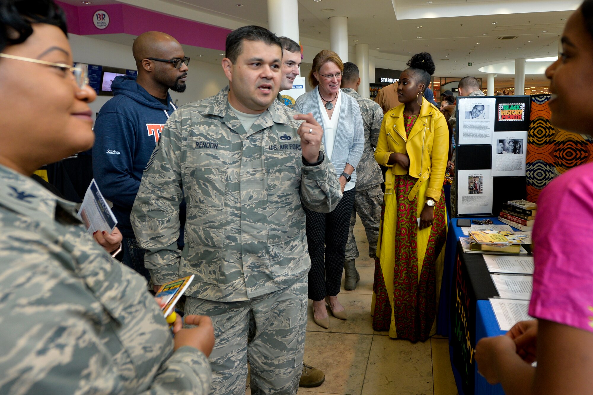 U.S. Air Force Chief Master Sgt. Ernesto J. Rendon Jr., 86th Airlift Wing command chief, center, speaks with Ramstein Air Base Airmen during the 86th Airlift Wing’s Diversity Day, Sept. 28. 2018. As the 86th AW’s newly appointed command chief, Rendon advises the commander and senior leadership on enlisted issues for the wing's 8,000 personnel.  (U.S. Air Force photo by Staff Sgt. Nesha Humes Stanton)