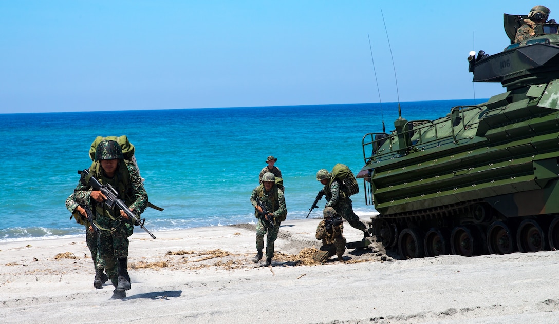 U.S. Marines and Philippine Marines conduct an amphibious landing during KAMANDAG 2 in Naval Education Training Command, Philippines, Oct. 6, 2018. KAMANDAG helps maintain a high level of readiness and enhances bilateral military-to-military relations and capabilities.