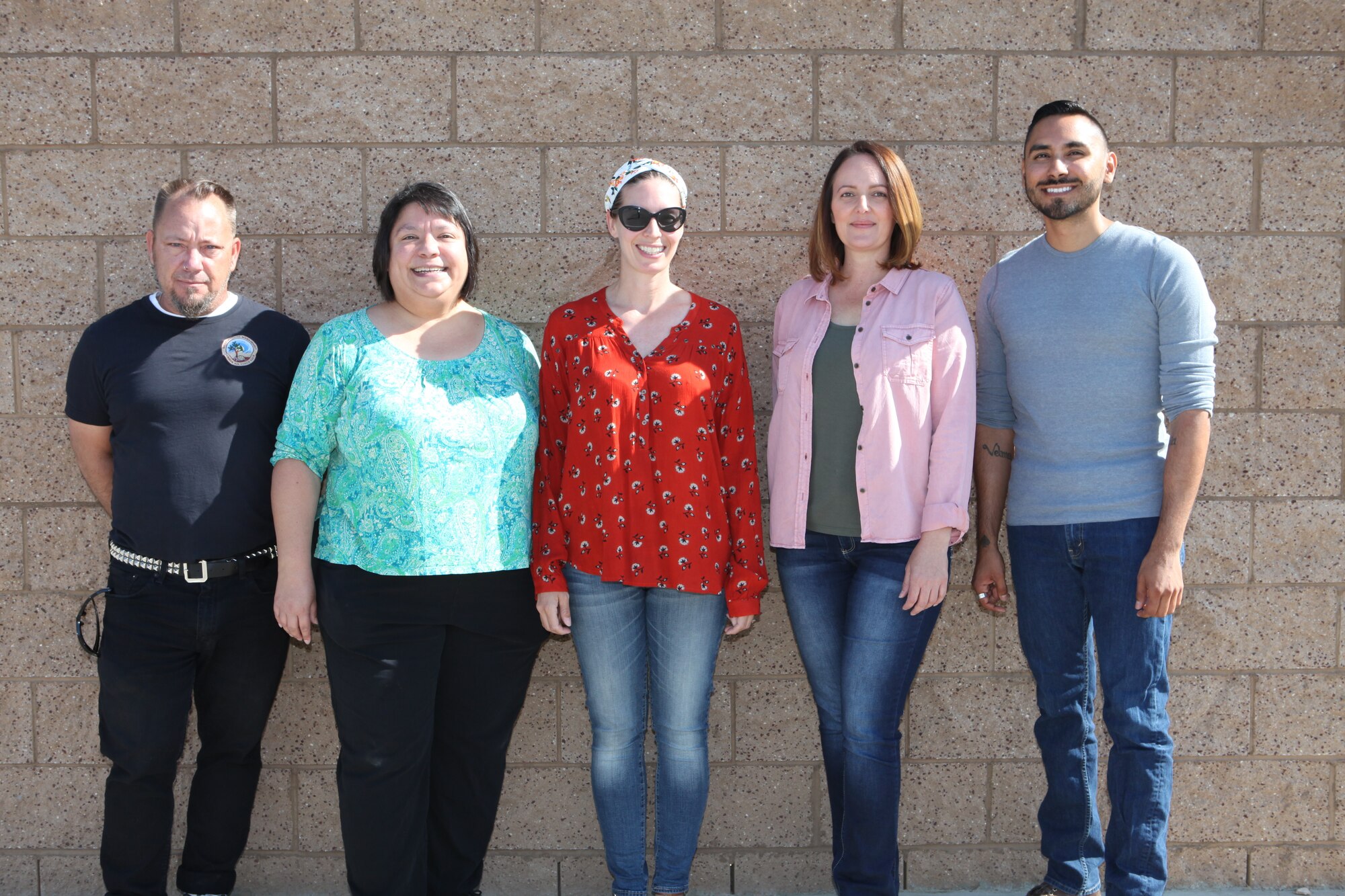 The 412th Civil Engineer Group Environmental Branch Hazardous Materials Improve Team are: (left to right) Shawn Hyde, D. Malama Chock, Jeanette Van Norden, Jennifer Weber and Larry Echaves. The team has been responsible for improving HAZMAT processes that saved the U.S. Air Force time and money. (Photo courtesy of 412th CEV HAZMAT Improvement Team)