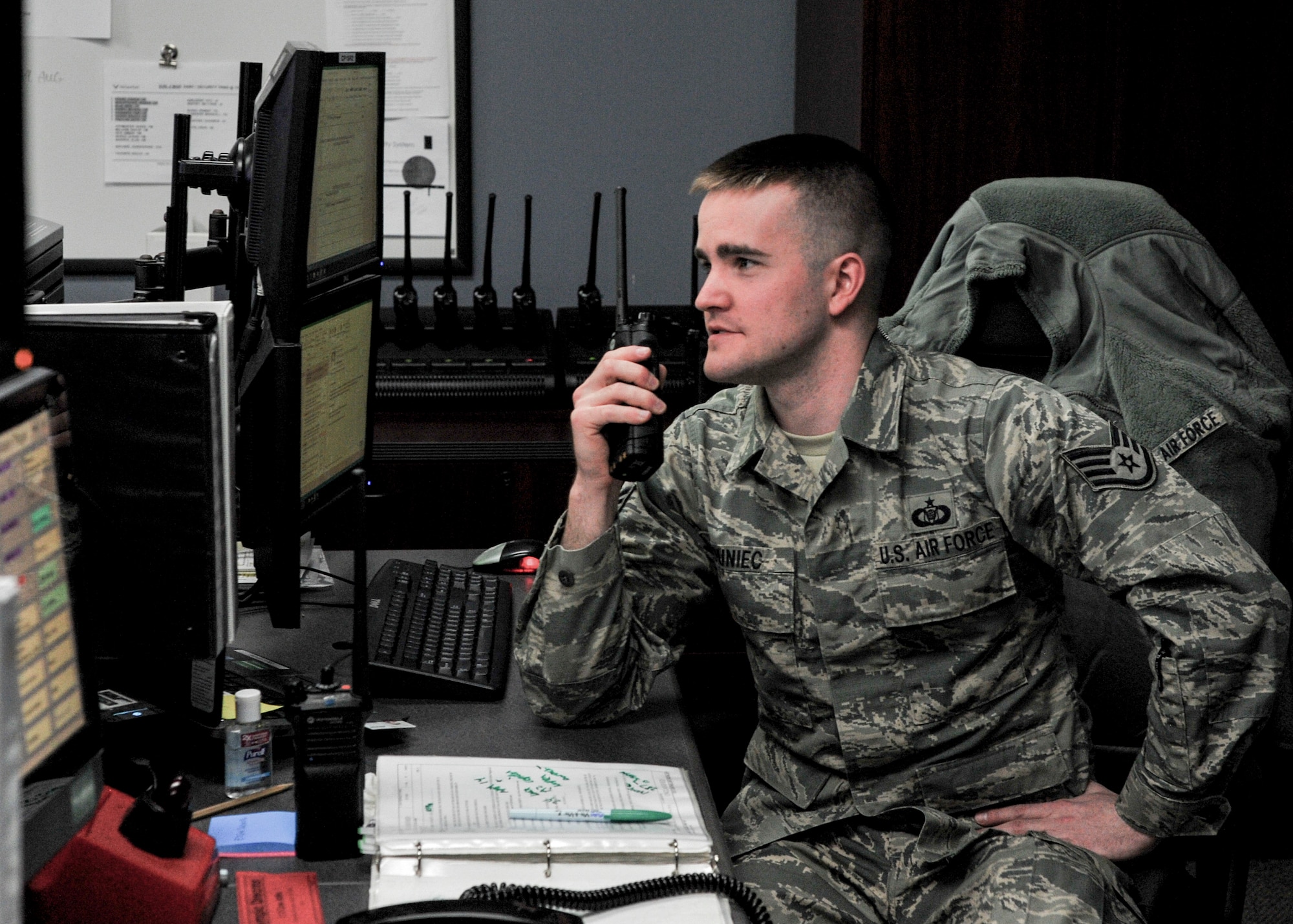Staff Sgt. Michael Duniec, an operations controller with the 910th Airlift Wing Command Post, coordinates a C-130H Hercules permission to park in a requested space on Youngstown Air Reserve Station’s flightline April 9, 2018. Duniec joined the Air Force Reserve at 17 with a parental wavier, he was inspired by his father’s four years active duty service in the Air Force working on the Titan II Two Missile Silos in peacetime.