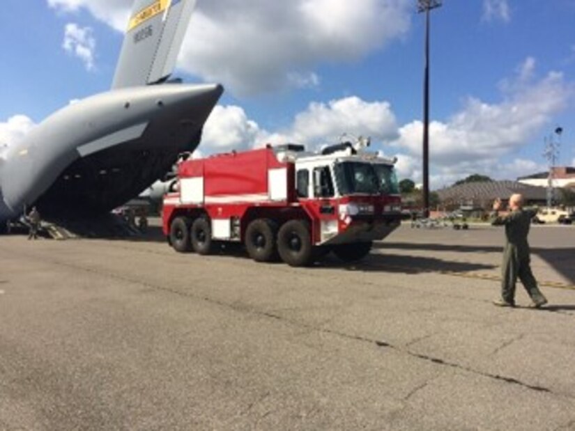 A P-23 Airport Rescue Fire Fighting Truck is loaded onto a C-17 Globemaster III Sept. 26, 2018, at Joint Base Charleston, S.C. The P-23 weighed 44,600 pounds and was airlifted to North Auxiliary Airfield in North, S.C., to maintain emergency response readiness of the airfield after Hurricane Florence.