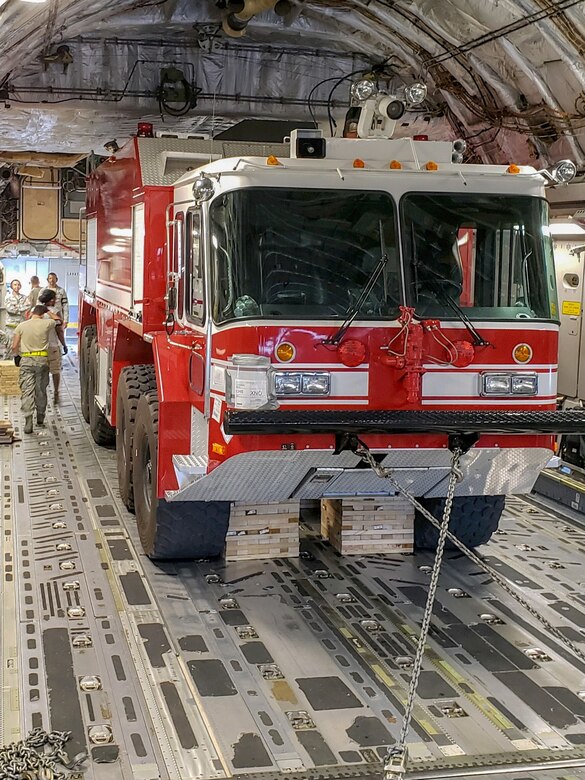 A P-23 Airport Rescue Fire Fighting Truck is shored and secured in a C-17 Globemaster III Sept. 26, 2018, at Joint Base Charleston, S.C. The P-23 weighed 44,600 pounds and was airlifted to North Auxiliary Airfield in North, S.C., to maintain emergency response readiness of the airfield after Hurricane Florence.