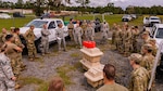 Members of the Florida National Guard Chemical, Biological, Radiological, Nuclear, High Yield Explosive Enhanced Response Force Package (CERF-P) prepare for missions in response to Hurricane Michael at Camp Blanding Joint Training Center near Starke, Florida on Oct. 9, 2018.