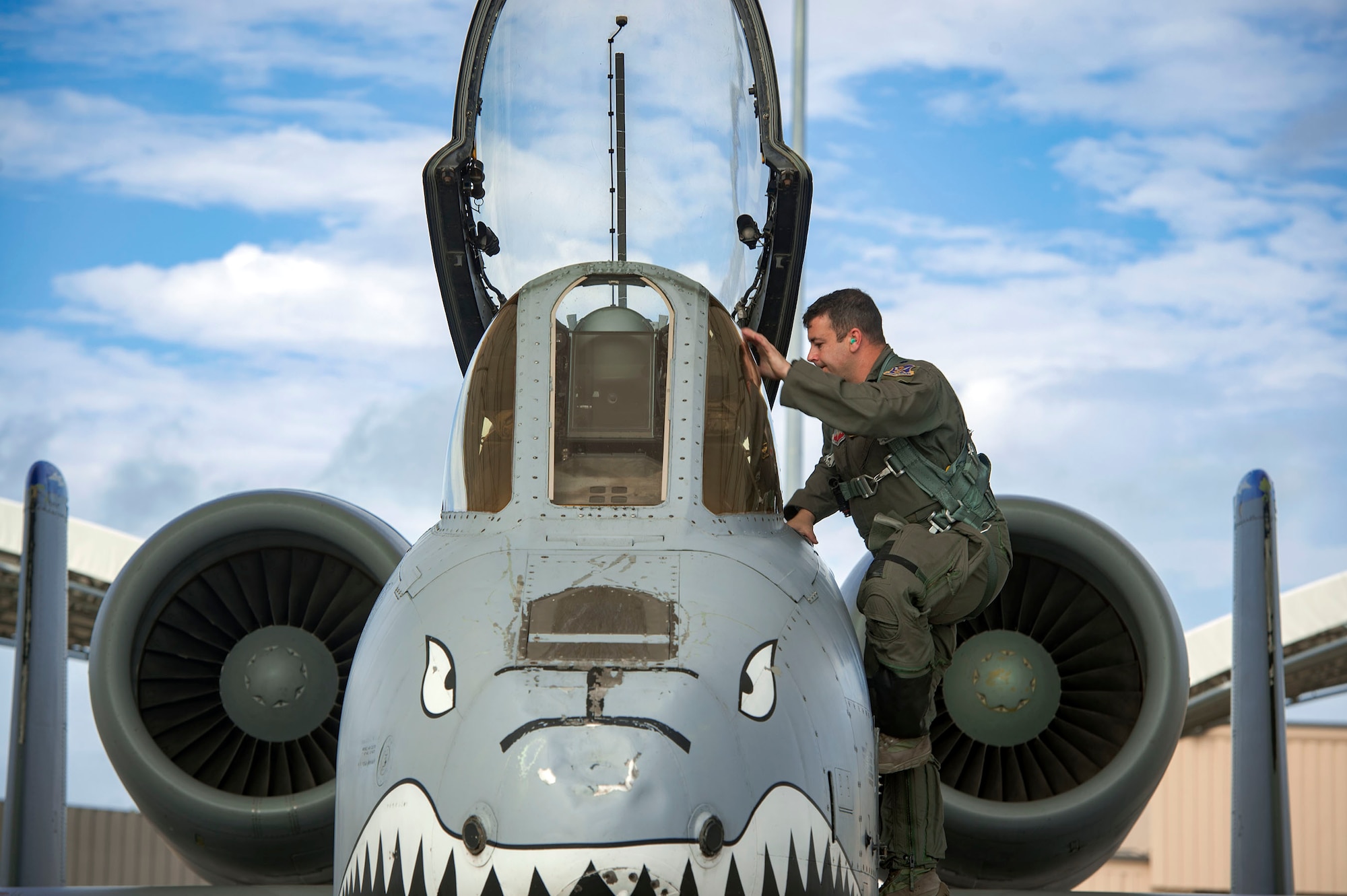 A 23d Fighter Group A-10C Thunderbolt II pilot climbs into an aircraft to relocate in anticipation of Hurricane Michael, Oct. 9, 2018, at Moody Air Force Base, Ga. While it is expected to be a Category 2 upon landfall, the current forecast anticipates Moody and the surrounding area will face tropical-storm-force winds Wednesday afternoon. (U.S. Air Force photo by Senior Airman Greg Nash)