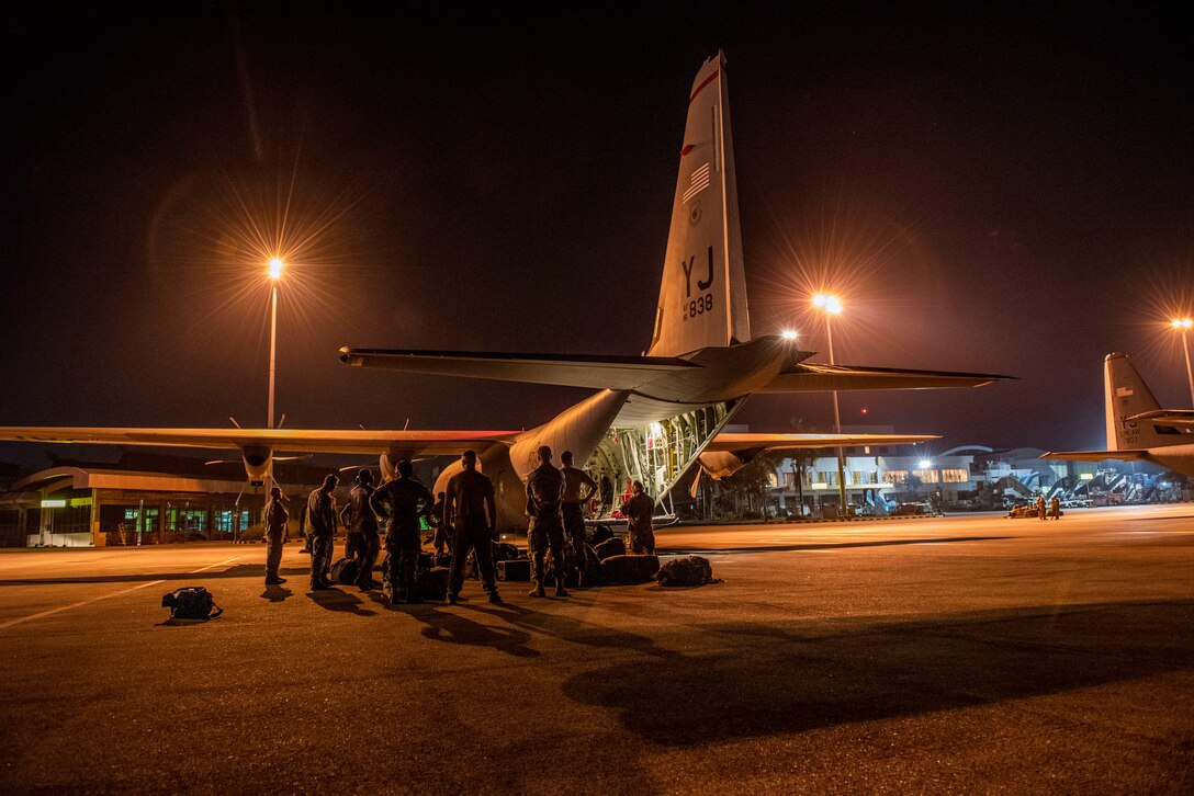 U.S. Air Force members assigned to the 36th Contingency Response Group Andersen Air Force Base, Guam, three C-130J Super Hercules aircraft and aircrew from the 374th Airlift Wing, Yokota Air Base, Japan arrive at Balikpapan, Indonesia Oct. 5, 2018. Members are supporting USAID’s humanitarian relief efforts after a 7.5 magnitude earthquake and tsunami struck Indonesia’s Sulawesi Island Sept. 28, 2018. (U.S. Air Force photo by Master Sgt. JT May III)
