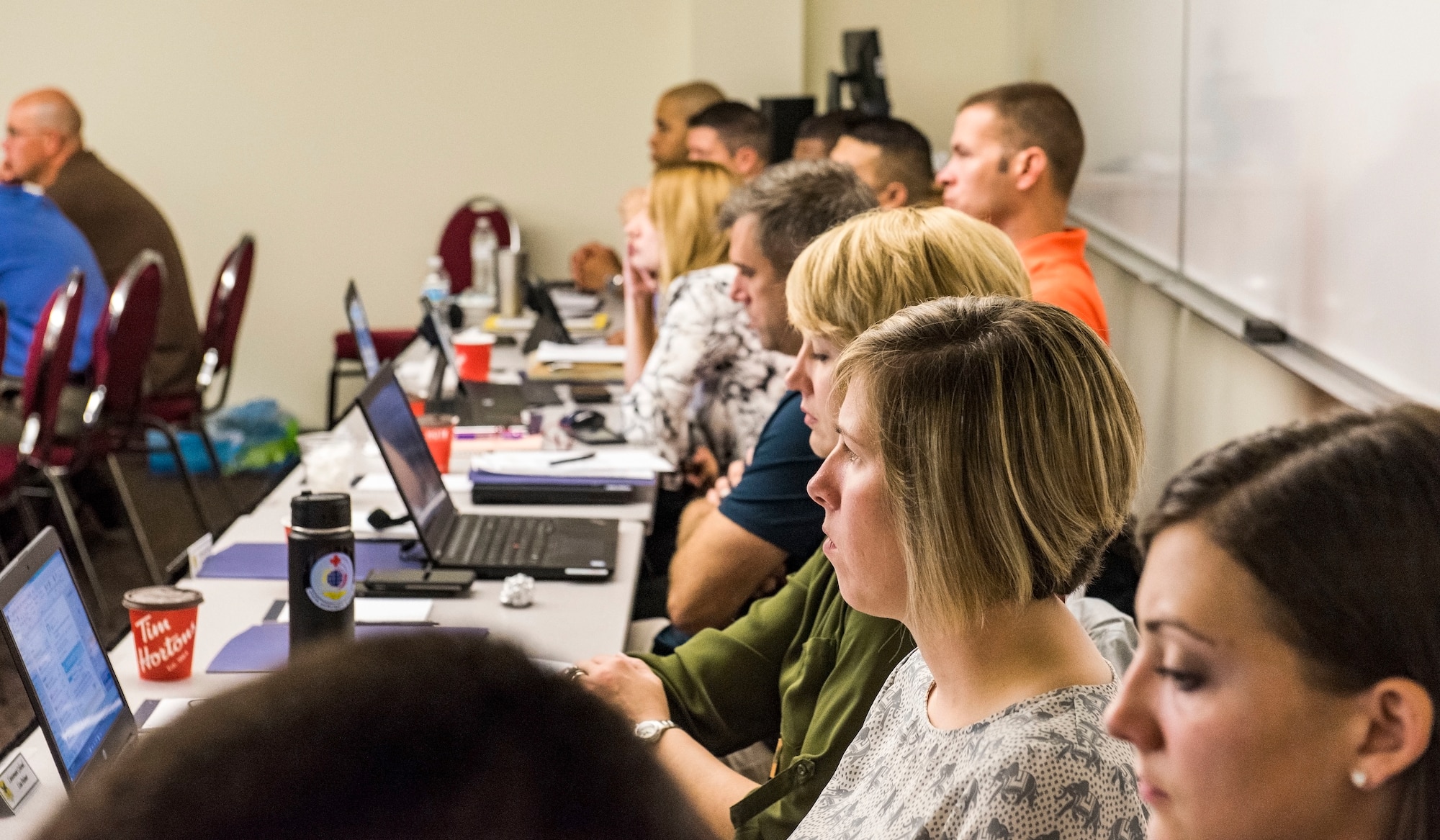 Team Dover senior leaders listen to Col. Joel Safranek, 436th Airlift Wing commander, during his opening remarks at a 436th AW leadership offsite Sept. 13, 2018, at Delaware Technical Community College in Dover, Del. Senior leadership discussed topics such as the 436th AW mission, vision and priorities; additional duties inventory, the wing strategic calendar, and wing manning during the two-day offsite. (U.S. Air Force photo by Roland Balik)