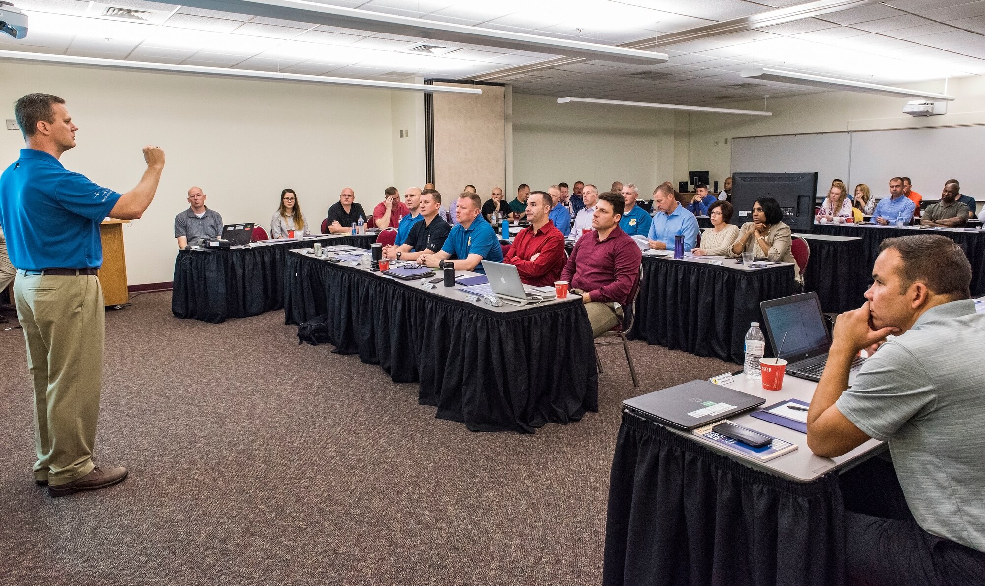 Col. Joel Safranek (left), 436th Airlift Wing commander, speaks to group and squadron commanders and superintendents at the start of a 436th AW leadership offsite meeting Sept. 13, 2018, at Delaware Technical Community College in Dover, Del. The two-day offsite brought leadership together to discuss numerous topics such as the mission, vision and priorities of the 436th AW. (U.S. Air Force photo by Roland Balik)