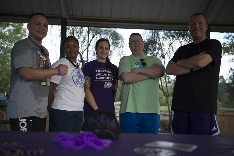 Team Shaw members pose after jogging laps around Memorial Lake at the Alzheimer’s walk at on Shaw Air Force Base, S.C., Oct. 4, 2018.