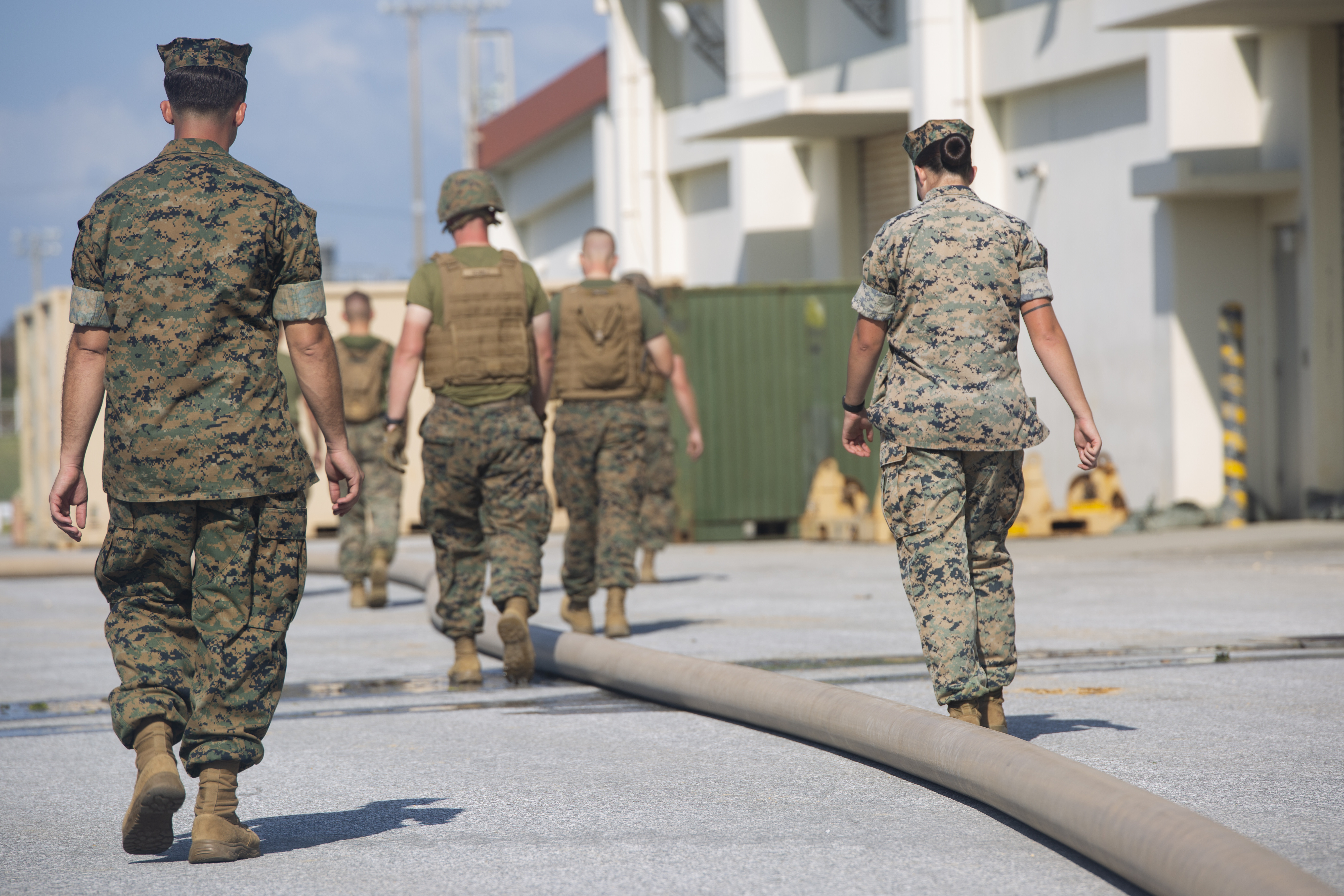 Walk the Line Marines with Bulk Fuel Company assemble a fuel site