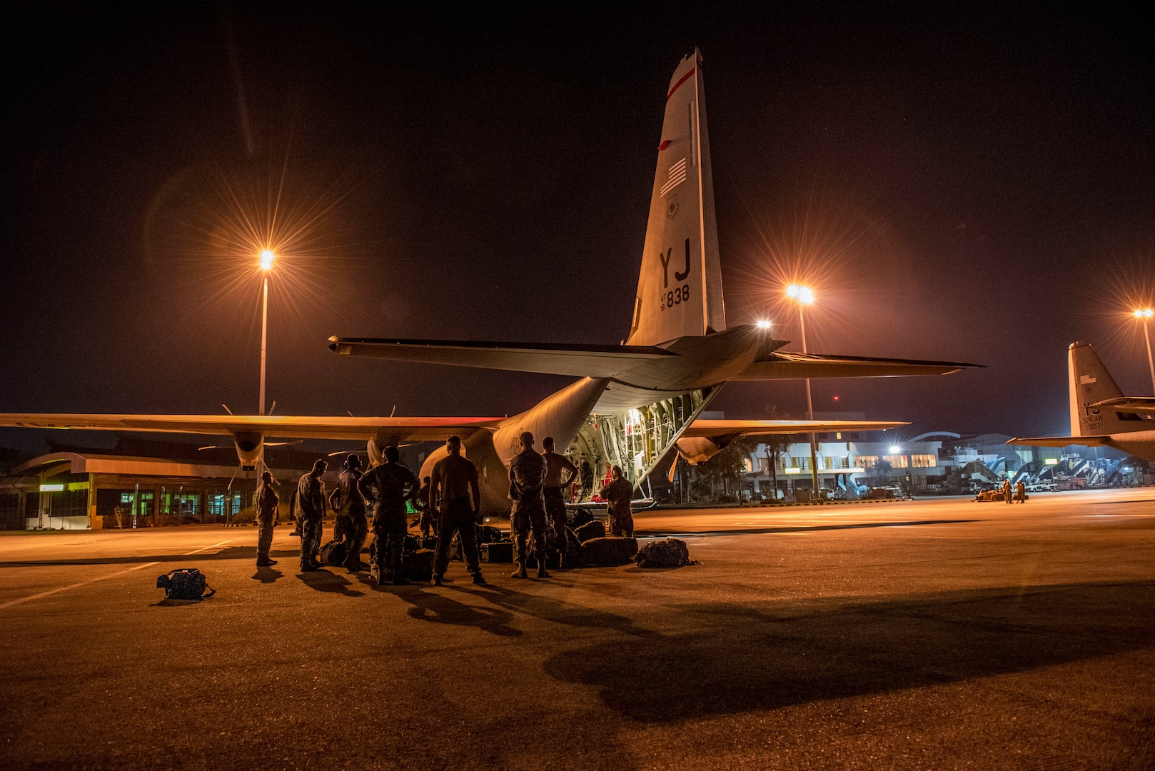U.S. Air Force members assigned to the 36th Contingency Response Group Andersen Air Force Base, Guam, three C-130J Super Hercules aircraft and aircrew from the 374th Airlift Wing, Yokota Air Base, Japan arrive at Balikpapan, Indonesia Oct. 5, 2018. Members are supporting USAID’s humanitarian relief efforts after a 7.5 magnitude earthquake and tsunami struck Indonesia’s Sulawesi Island Sept. 28, 2018. (U.S. Air Force photo by Master Sgt. JT May III)