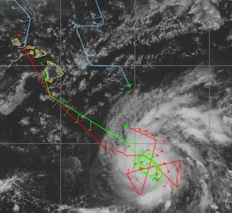 Personnel from the Joint Typhoon Warning Center had the opportunity to fly with the NOAA WP-3D Orion Hurricane Hunter aircraft out of Pearl Harbor, HI, into the approaching Hurricane Lane (14E). While flying several routes both around and through the hurricane, Hurricane Hunter aircraft deployed dropsondes and vertical radar to measure atmospheric parameters and storm structure, providing real-time information to forecasters. Atmospheric data is also ingested into numerical weather models, improving their accuracy. The Hurricane Hunters also fly a Gulfstream IV aircraft at higher altitudes above the convection of the storm. Additionally, an Air Force Reserve C-130 aircraft and NASA-operated DC-8 aircraft contributed to sampling Hurricane Lane, improving forecast accuracy and disaster preparedness for the Hawaiian Islands.