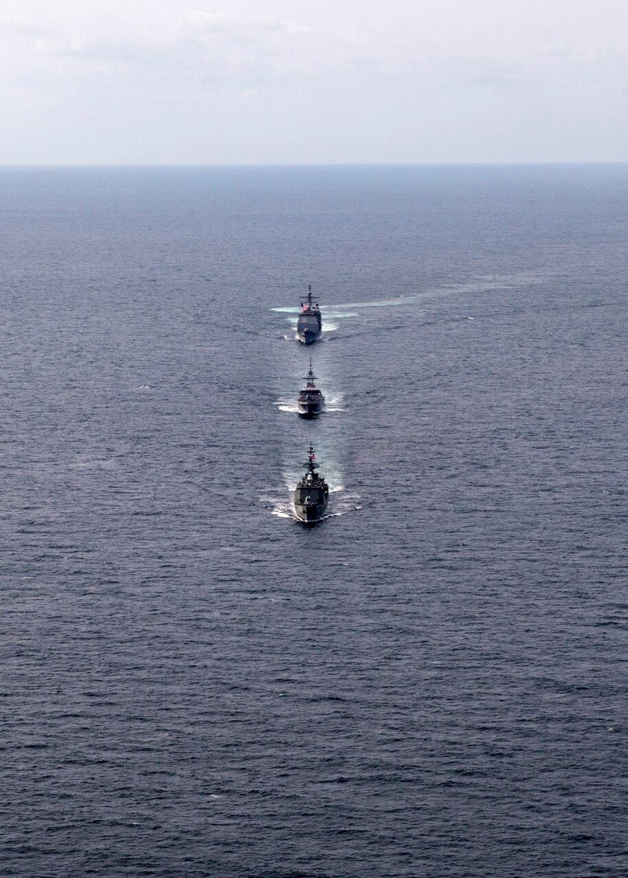 EAST CHINA SEA (Oct. 9, 2018) The Ticonderoga-class guided-missile cruiser USS Antietam (CG 54), the Royal Thai Navy offshore patrol vessel HTMS Krabi (OPV 551) and Royal Thai Navy frigate HTMS Taksin (FFG 422) conduct a tactical maneuvering during a cooperative deployment. Antietam is forward deployed to the U.S. 7th Fleet area of operations in support of security and stability in the Indo-Pacific region.