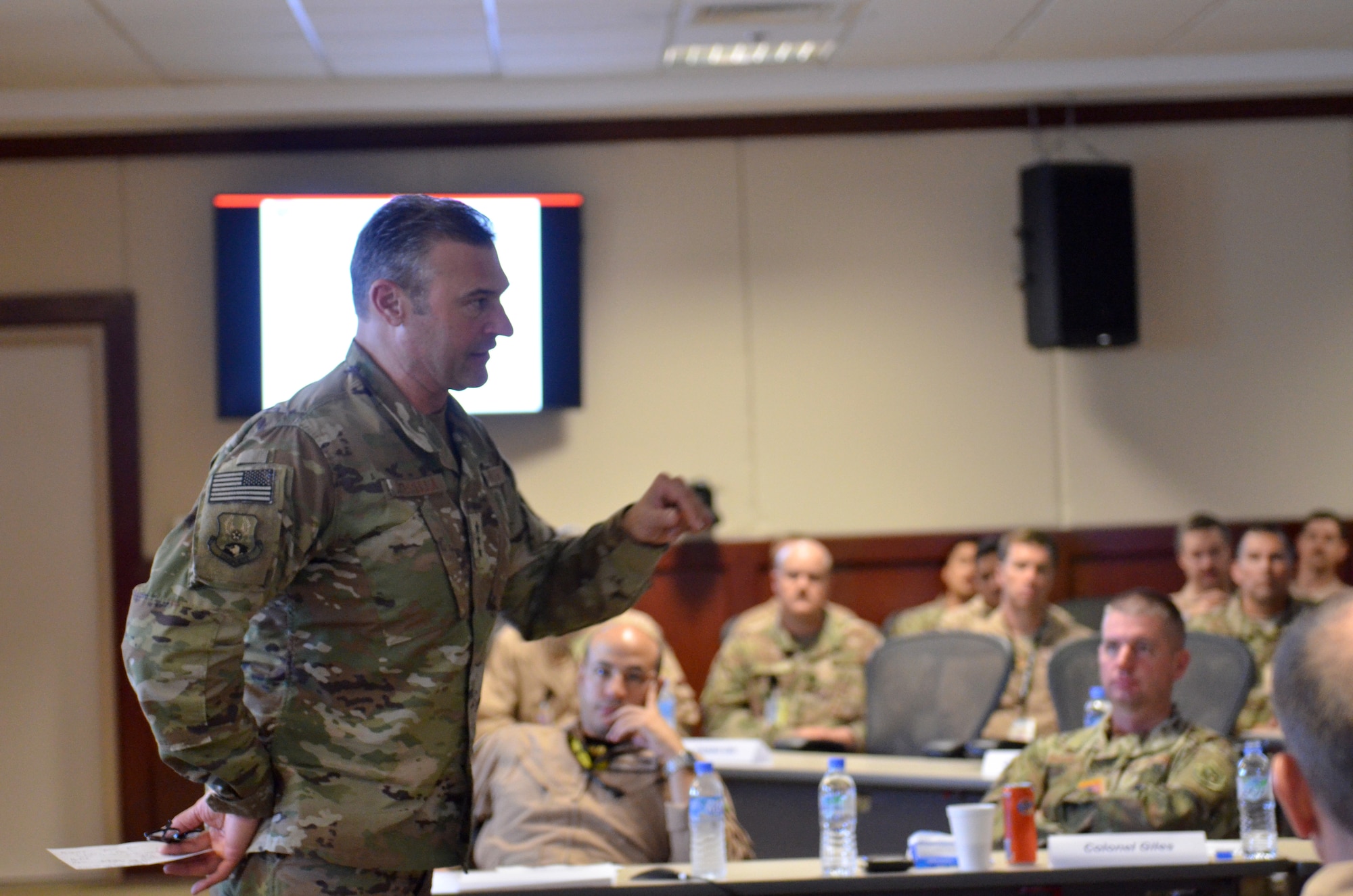 Combined Force Air Component Commander Lt. Gen. Joseph T. Guastella gives closing remarks Sept. 27, 2018 at Al Udeid Air base, Qatar during the bi-annual Weapons and Tactics Conference. This conference brings tactical experts from across the area of responsibility discussed current issues and provide solutions for challenges facing the U.S. Air Force, joint services, and coalition partners. (U.S. Air Force photo by Staff Sgt. Caitlin Conner)