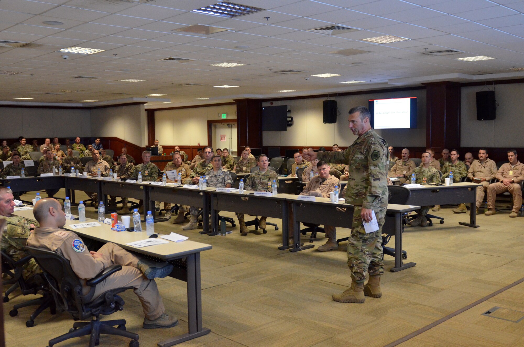 Combined Force Air Component Commander Lt. Gen. Joseph T. Guastella gives closing remarks Sept. 27, 2018 at Al Udeid Air base, Qatar during the bi-annual Weapons and Tactics Conference (WEPTAC). WEPTAC allows Airmen the unique opportunity to have direct conversations between tactical experts and senior leadership in order to make improvements that better serve the mission and Airmen on the ground. (U.S. Air Force photo by Staff Sgt. Caitlin Conner)
