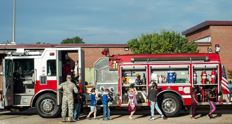 Team Shaw members assigned to the 20th Civil Engineer Squadron fire department visit Shaw Heights Elementary School during Fire Prevention Week at Shaw Air Force Base, S.C., Oct. 9, 2018.