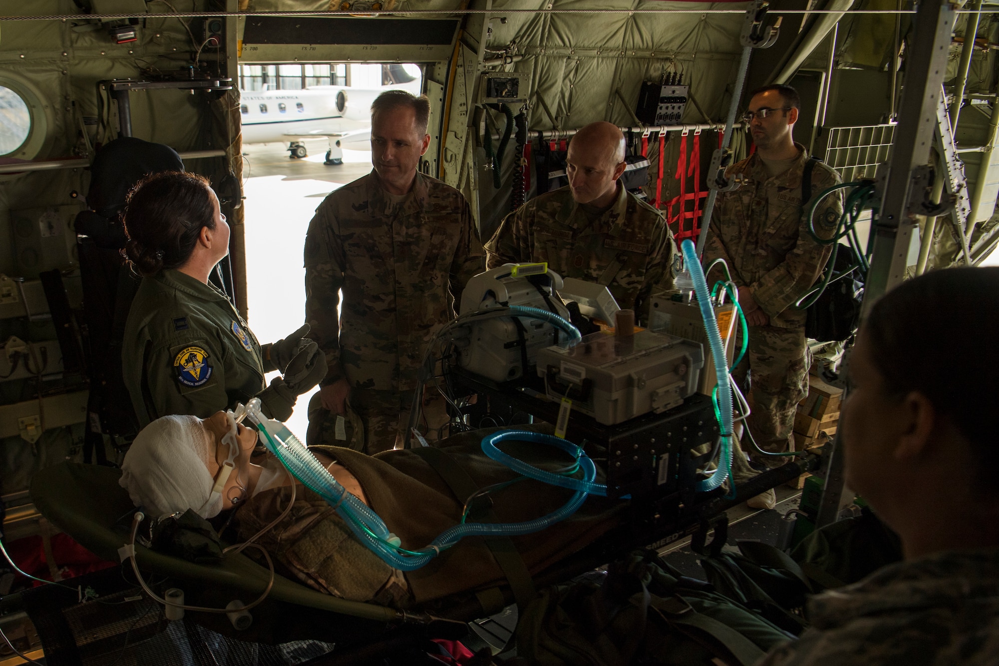 U.S. Air Force Capt. April Oliver, 86th Medical Squadron Critical Care Air Transport Team nurse, briefs Maj. Gen. John Wood, Third Air Force commander during a tour with the 86th Airlift Wing Oct. 5, 2018, at Ramstein Air Base, Germany. Falling under the Third Air Force, members of the 86th further explained the successful role they play in Ramstein’s diverse mission. (U.S. Air Force photo by Senior Airman Devin M. Rumbaugh)