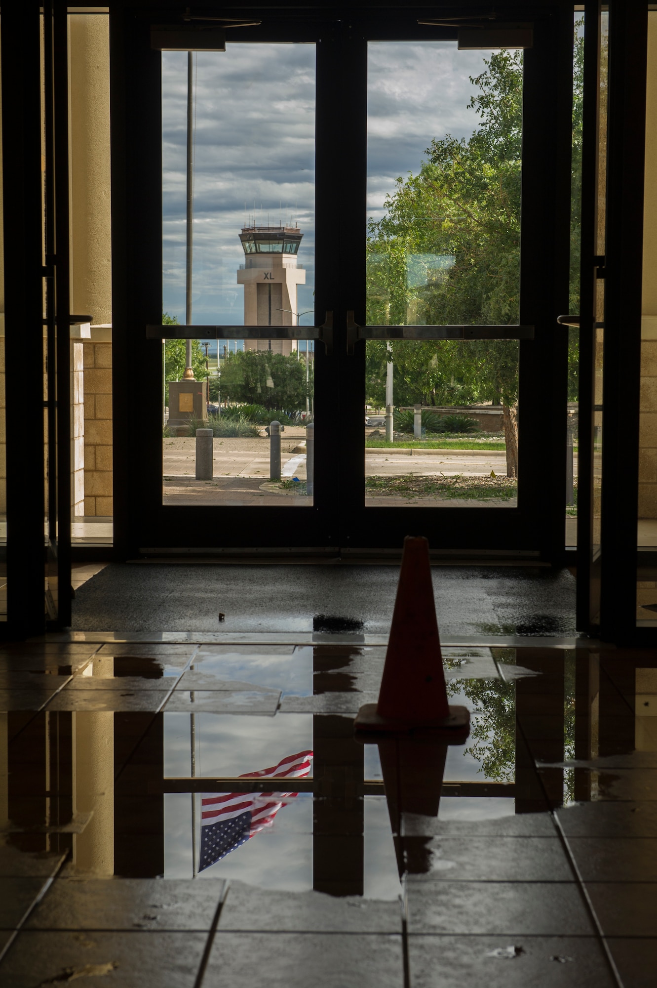Standing water made its way into the 47th Flying Training Wing headquarters building after a severe thunderstorm rolled through Laughlin Air Force Base, Texas, Oct. 9, 2018. Laughlin was hit early Tuesday morning with a severe thunderstorm that brought more than five inches of rain, a maximum wind velocity of 72 miles per hour and even strong tornadic rotation in the local area. (U.S. Air Force photo by Senior Airman Benjamin N. Valmoja)