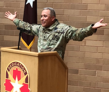 Command Sgt. Maj. Napoleon Noguerapayan, Army Medical Department NCO Academy commandant, speaks to the crowd during the Brooke Army Medical Center National Hispanic Heritage Month event in the hospital’s Medical Mall Oct. 3. Noguerapayan described growing up in Managua, Nicaragua, being the youngest of 15 siblings; and highlighted this year’s theme, “One Endless Voice to Enhance Our Traditions.”