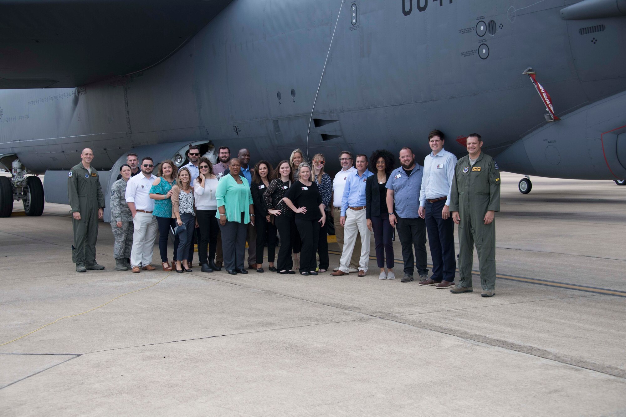 Airmen and civic leaders from the Shreveport-Bossier City area pose outside of a B-52 Stratofortress at Barksdale Air Force Base, Louisiana, Oct. 9, 2018.  The group toured the jet and spoke with Airmen to learn more about the Air Force mission during their informational tour as the future generation of leaders for the community.  (U.S. Air Force photo by Master Sgt. Ted Daigle)