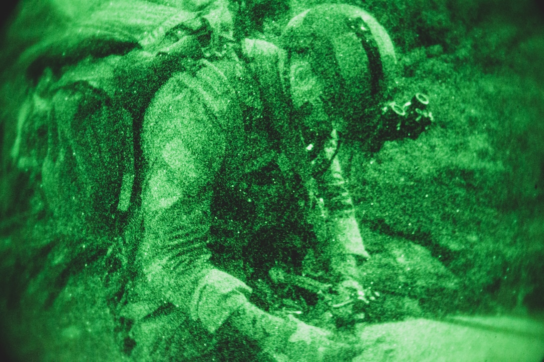 A U.S. Army Special Forces soldier, with Operational Detachment Alpha, begins a night-time rappelling exercise during a mountaineering course, aboard Marine Corps Mountain Warfare Training Center, Bridgeport, Calif., July 28, 2018. Any special operations force element that comes to MCMWTC has the opportunity to do their list of schools; ranging from Assault Climber, Mountain Medicine, Mountain Sniper and others, or they can program their own training through use of an internal mountaineering subject matter expert. (U.S. Marine Corps photo by Lance Cpl. Rachel K. Young)
