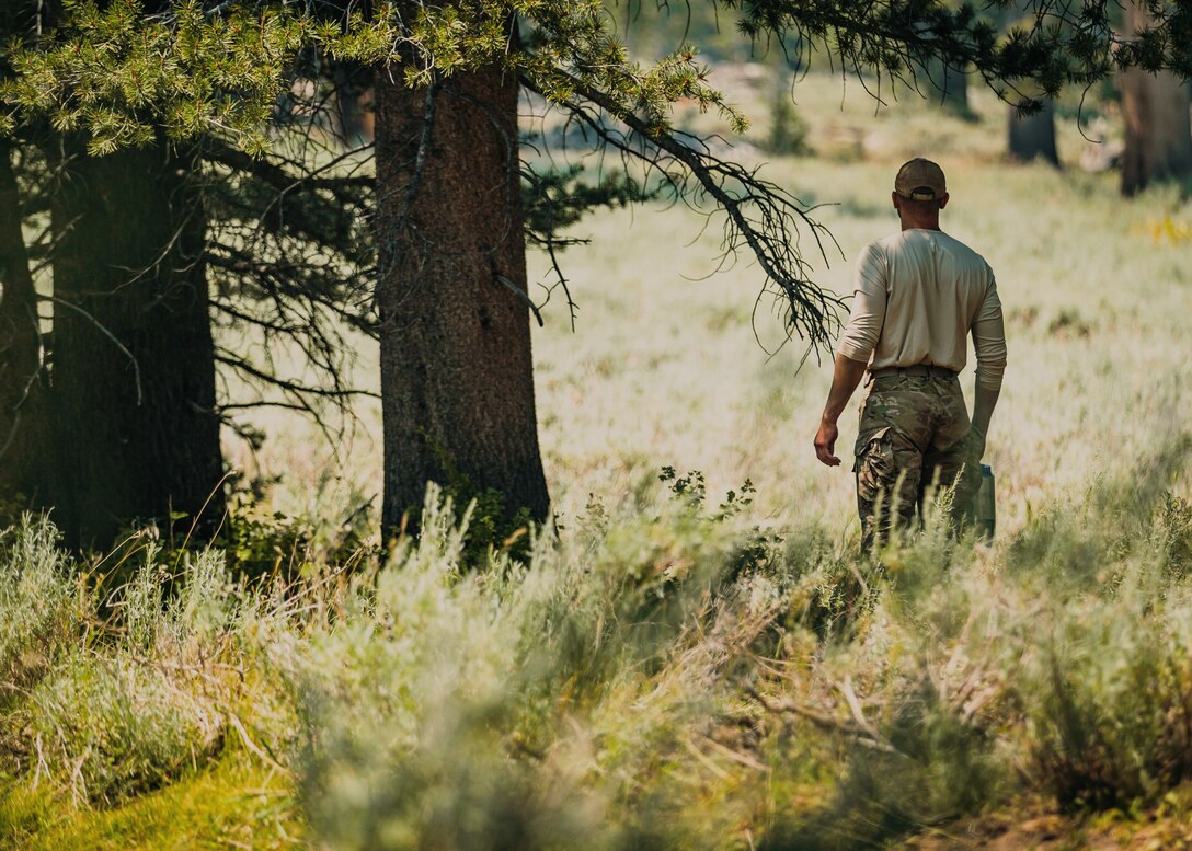 A U.S. Army Special Forces soldier with Operational Detachment Alpha looks over the landscape of Marine Corps Mountain Warfare Training Center, Bridgeport, Calif., Aug. 5, 2018. Any special operations force element that comes to MCMWTC has the opportunity to do their list of schools; ranging from Assault Climber, Mountain Medicine, Mountain Sniper and others, or they can program their own training through use of an internal mountaineering subject matter expert. (U.S. Marine Corps photo by Lance Cpl. Rachel K. Young)