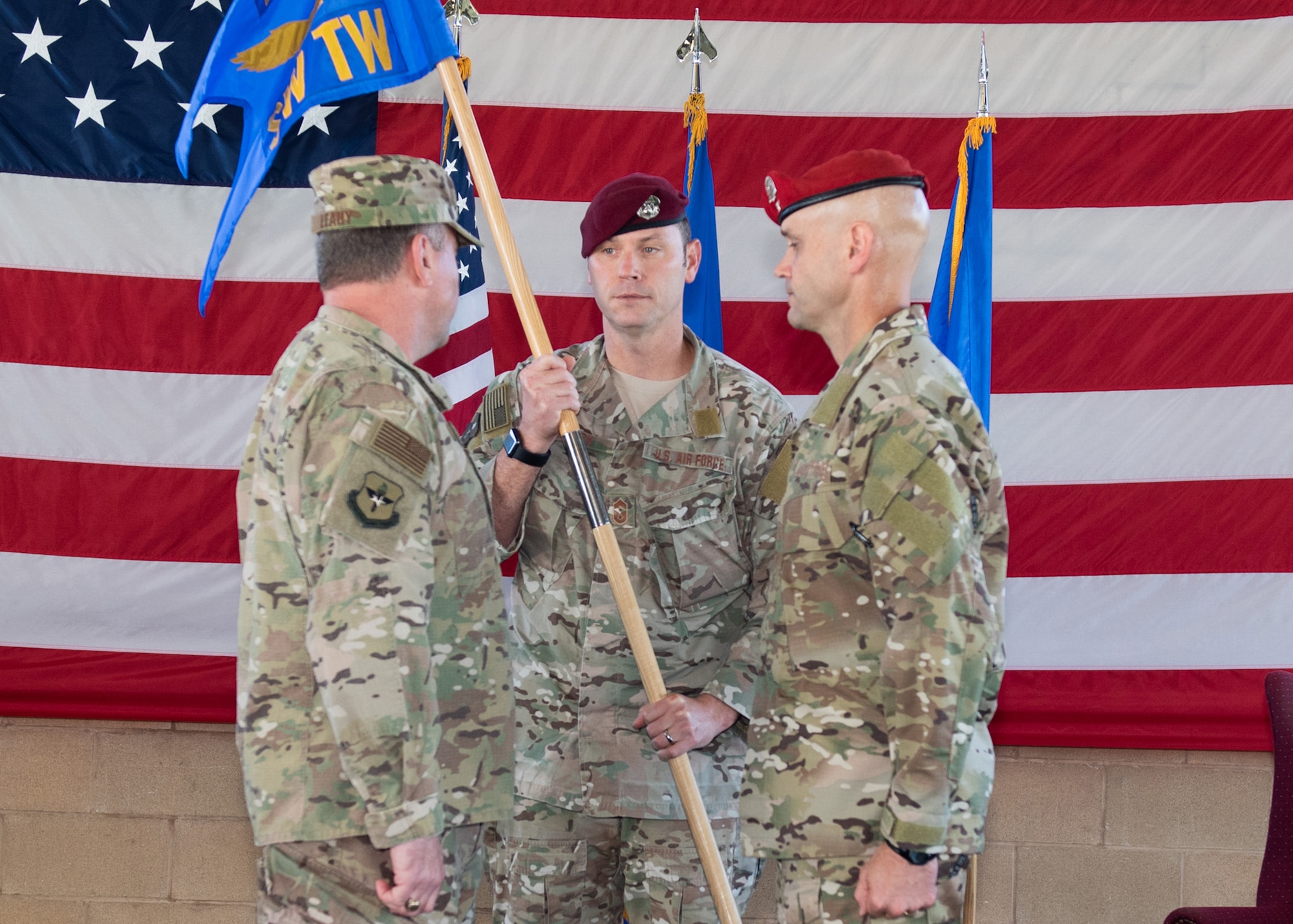 U.S. Air Force Maj. Gen. Timothy J. Leahy, Second Air Force, commander, 2nd Air Force Base, Mississippi gives command of the Special Warfare Training Wing (SWTW), Joint Base San Antonio-Medina Base, Texas to Col. James Hughes during the wing activation ceremony Oct. 10, 2018. The mission of the new wing is to select, train, equip, and mentor Airmen to conduct global combat operations in contested, denied, operationally limited, and permissive environments under any environmental conditions. (U.S. Air Force photo by Andrew C. Patterson)