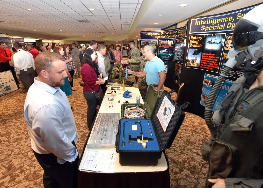 Attendees learn about the work and mission of various directorates across the Air Force Life Cycle Management Center at the annual Newcomers Expo Oct. 3, 2018. (U.S. Air Force Photo/Al Bright)